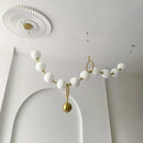Modern brass and glass ball pendant light – dining room chandelier