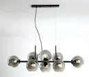 Modern brass and gray glass pendant lights for kitchen dining room