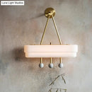 Modern brass and gray sconce light fixture – dining room wall lamp