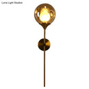 Modern brass and smoke gray glass wall light bedroom sconce