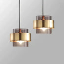 Modern brass and smoked glass pendant light dining room decorbites gold wrought iron