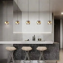Modern brass and smoked glass pendant light dining room decorbites gold wrought iron