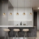 Modern brass and smoked glass pendant light dining room