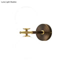 Modern brass and white glass wall sconce – bedroom globe light