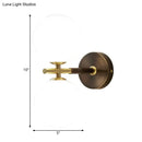 Modern brass and white glass wall sconce – bedroom globe light
