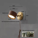Modern brass and wood base wall sconce for living room spotlight
