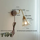 Modern brass and wood wall sconce amber led bathroom light