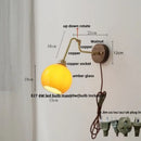 Modern brass and wood wall sconce amber led bathroom light