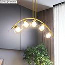 Modern brass arch arm 5-light pendant – dining room glass orb light