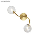 Modern brass clear tan glass wall lamp – stairway 2-light led