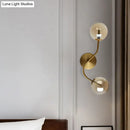 Modern brass clear tan glass wall lamp – stairway 2-light led