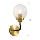 Modern brass curved arm wall sconce with clear glass for bedroom