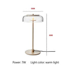 Modern brass floor lamp with glass lampshade for living room