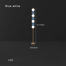 Modern brass floor lamp with six spheres for living room decor