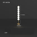 Modern brass floor lamp with six spheres for living room decor
