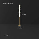 Modern brass floor lamp with six spheres for living room decor