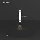 Modern brass floor lamp with six spheres for living room decor