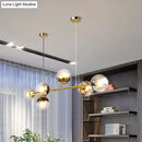 Modern brass glass ball linear pendant light for dining room