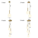Modern brass glass ball pendant lights for kitchen decor