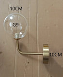 Modern brass glass ball wall lamp bedroom amber globe lighting