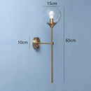 Modern brass golden glass wall sconces for bedroom globe light