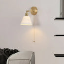 Modern brass wall lamp with frosted glass shade for bedroom reading