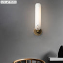 Modern brass wall lamp with opal glass shade bedroom sconce
