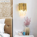 Modern brass wall mount light with clear crystal prism bedroom sconce