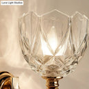 Modern brass wall sconce bedroom light with faceted clear glass shade