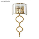 Modern brass wall sconce with crystal rectangle shade bedroom light
