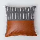 Modern brown faux leather and geometric pillow cover living room