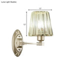 Modern brushed brass and green glass wall sconce bedroom light fixture