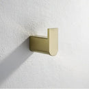 Modern brushed gold bathroom hardware set with shelf and phone holder