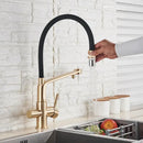 Modern brushed gold swivel kitchen faucet with black rubber hose
