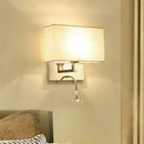 Modern chrome and beige fabric shade wall light bedroom sconce