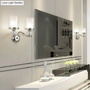 Modern chrome dual cylinder bathroom sconce with curvy arm