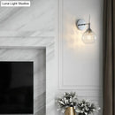 Modern chrome finish wall lamp with crystal inner glass bedroom light