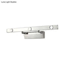 Modern chrome wall light with adjustable stainless steel shade bathroom