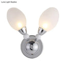 Modern chrome wall light with white glass shades bedroom sconce