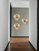Modern circular swirling designer glass wall lamp for bedroom