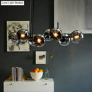 DecorBites™ Clear/Smoke Glass 8 Bulbs Suspended Lighting Fixture in Black/Gold for Dining Room