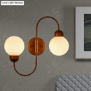 Modern copper and white glass spherical wall sconce living room light
