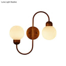 Modern copper and white glass spherical wall sconce living room light