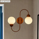 Modern copper and white glass spherical wall sconce living room light