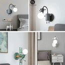 Modern creative minimalism metal robot ant wall sconce bedroom light