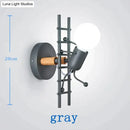 Modern creative minimalism metal robot ant wall sconce bedroom light