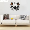 Modern crystal cone wall mount sconce in black for living room