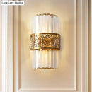 Modern crystal wall light with gold filigree band – study room sconce