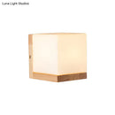 Modern cube shaped sconce wall lamp with wooden backplate bedroom light
