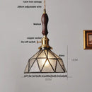 Modern geometric blue glass and brass pendant light – dining room